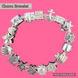 Charm Bracelet silver tone 16 individual charms 7.5" length & secure clasp
